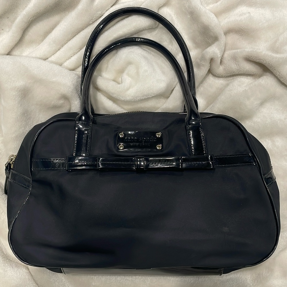 Black vinyl and patent leather small Kate Spade tote.
